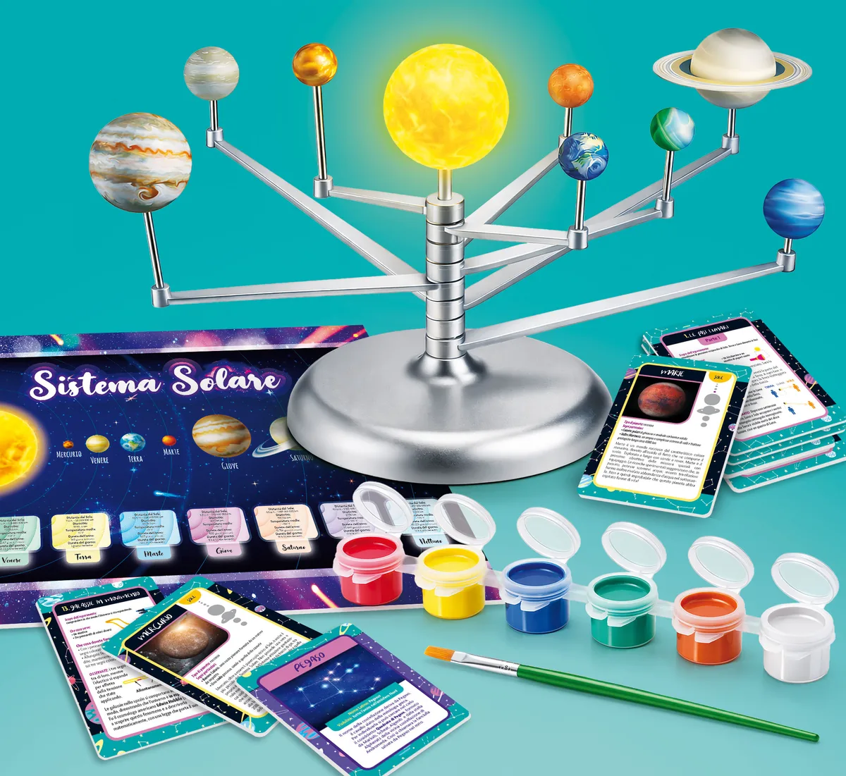 Modèle du système solaire monté sur sa tige, pots de couleur, pinceau, cartes et poster du kit Lisciani